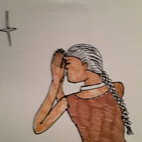 Native praying to star